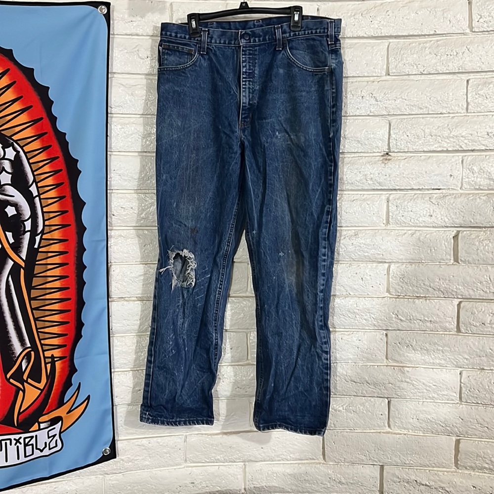 Distressed carhartt denim jeans